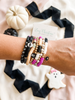 Spooky Halloween Stacking Bracelet Set – Heishi Beads, Gold Accents, Skull & Spider Charms – Halloween Arm Candy, Beaded Stretch Bracelets